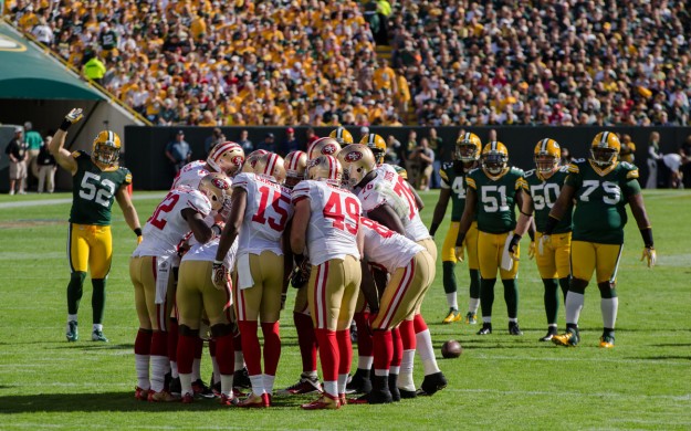 San Francisco 49ers Huddle Against Packers